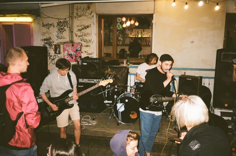 Sharpie, Stalls, and Street Cred: What the Venue Bathroom Knows About Your Next Favorite Band